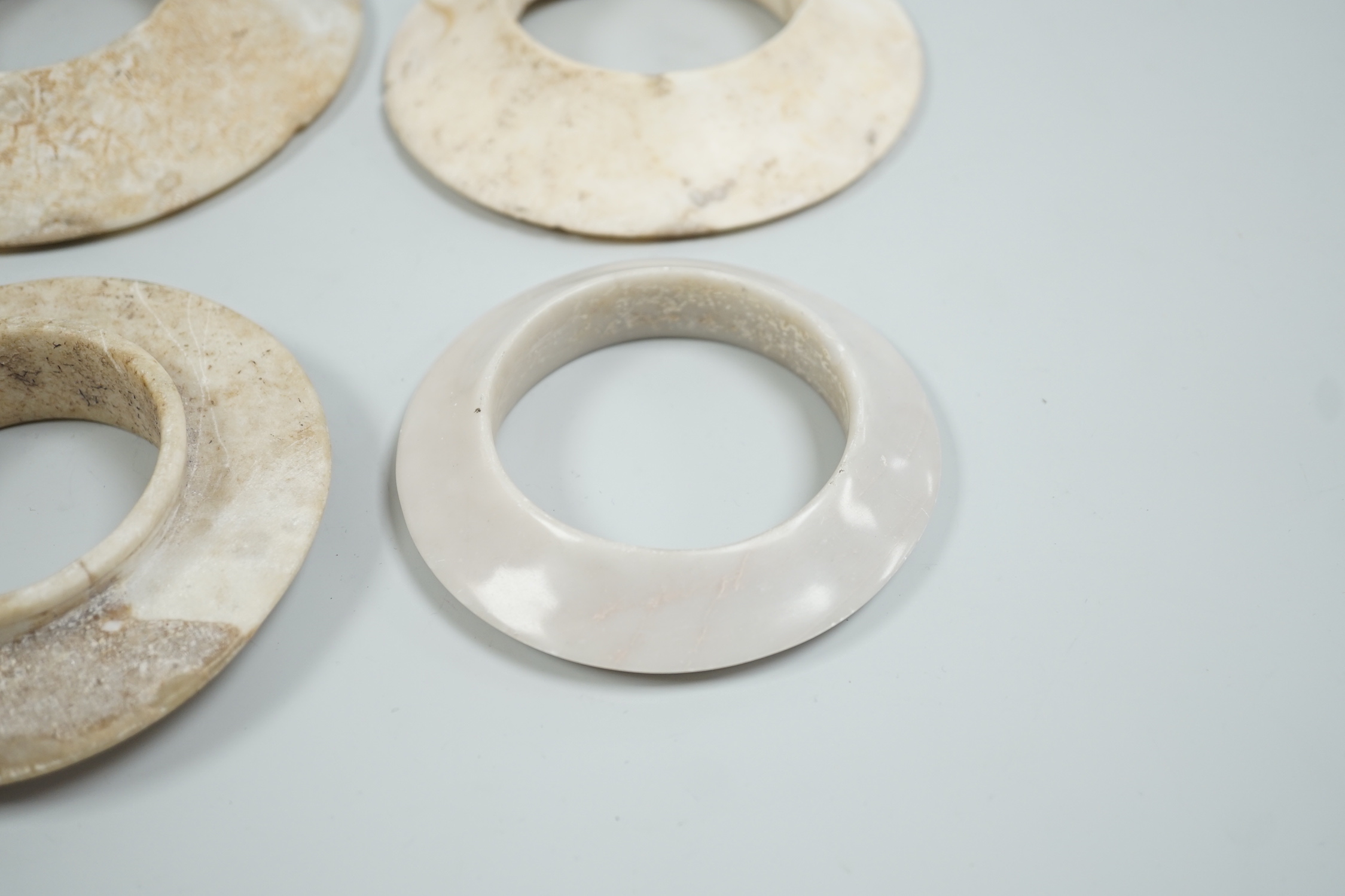 Four Indonesian marble bangles